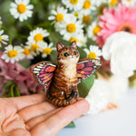 Tabby Catfly with pink butterfly wings