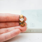 Tiger with a star pendant