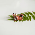 Tiger with a star pendant