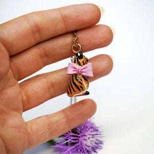 Tiger with a pink bow pendant