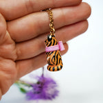 Tiger with a pink bow pendant
