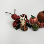 Death's head tiger pendant