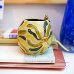 Ceramic vase with a little tiger