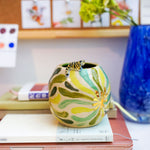 Ceramic vase with a little tiger