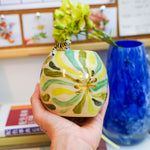 Ceramic vase with a little tiger