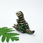 T-rex fossil figurine