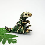 T-rex fossil figurine