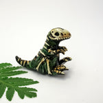 T-rex fossil figurine