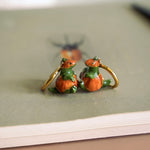 T-rex in the pumpkins earrings
