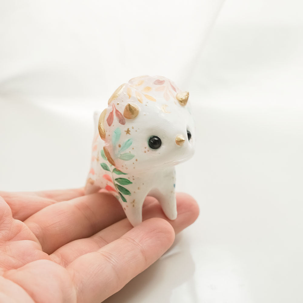 Triceratops with the Moon figurine