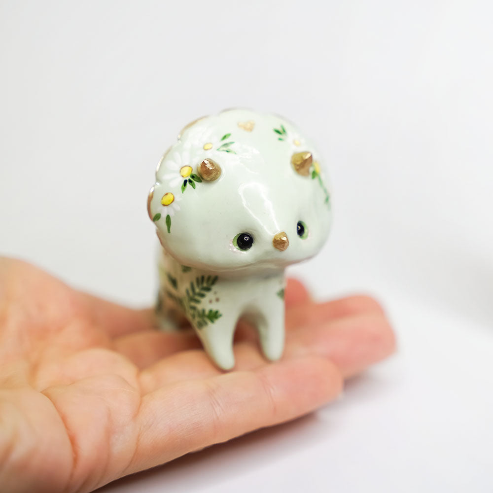 Mint triceratops with flowers