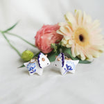 Triceratops with blue flowers pendant
