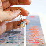 Tufted titmouse with a star pendant