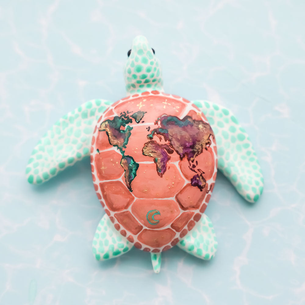 Sea turtle with the World map