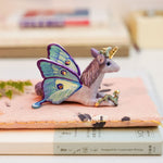 Unicorn with little dragons figurine