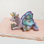 Unicorn with little dragons figurine