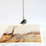 Wagtail white with a lace pendant