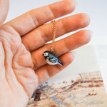 Wagtail white with a lace pendant