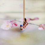 Weasel in the meadow pendant