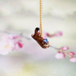 Weasel in the meadow pendant