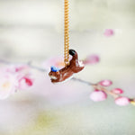 Weasel in the meadow pendant