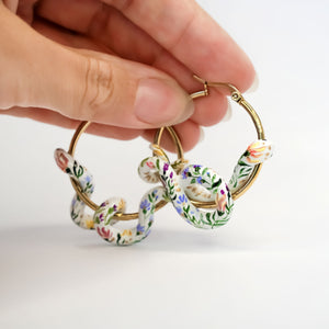 Flowers snakes earrings - gold