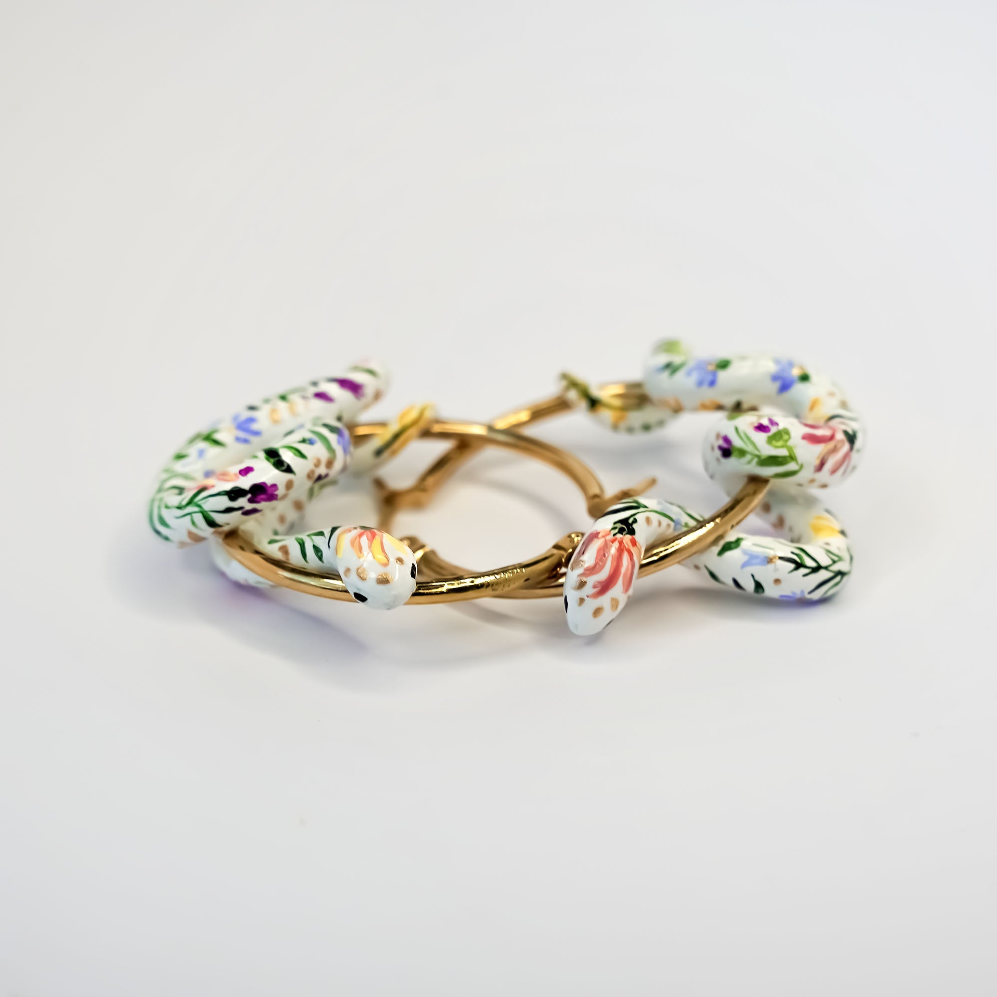 Flowers snakes earrings - gold
