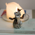 Wolf with bats figurine