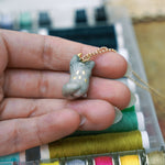 Wolf with the gold Moon pendant