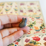 Wolf with a gold moon pendant