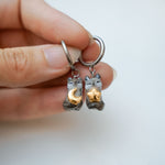 Wolfs with star and moon earrings
