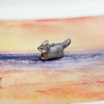 Wolf with a silver moon pendant