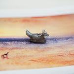 Wolf with a silver moon pendant