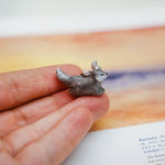 Wolf with a silver moon pendant