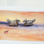 Wolf with a silver moon pendant