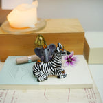 Baby zebra and Elephant figurine