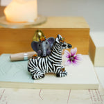 Baby zebra and Elephant figurine