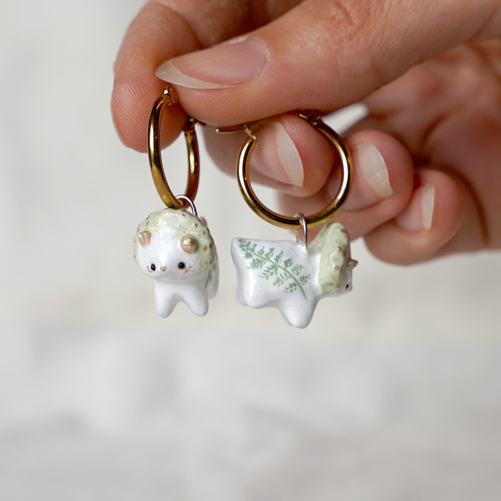 Triceratops with fern earrings
