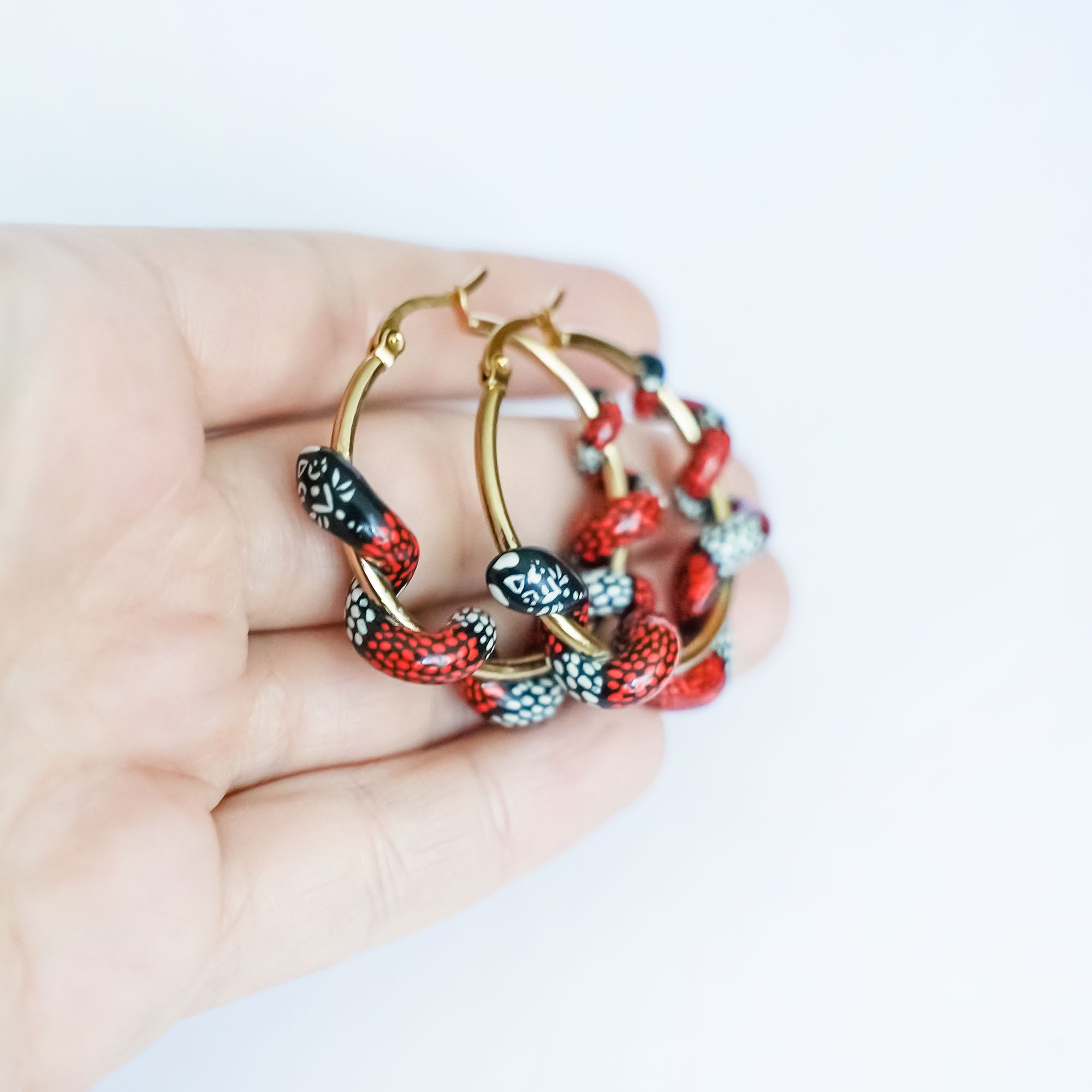 Coral snake earrings